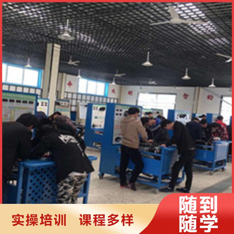 周邊學新能源汽修的學校|虎振學校地址